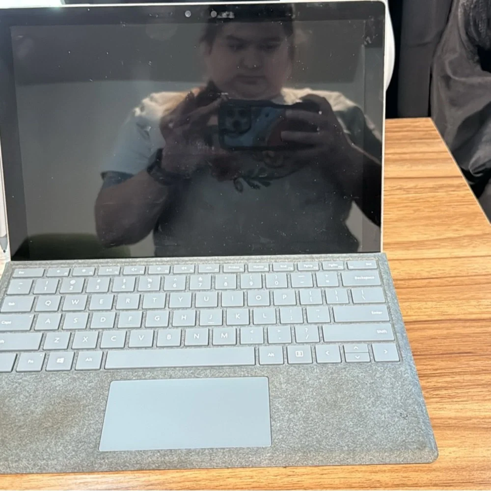 Sleek Silver Laptop with Accessories